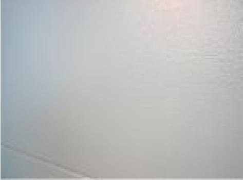 Sectional garage door PVC : Stucco non ligné Blanc 9010 RAL 